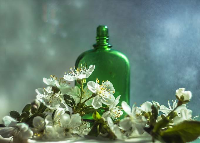 Green Bottle and Blossoms