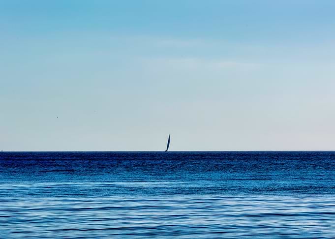 Sailboat on Calm Sea