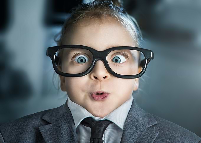 Surprised Little Girl in Glasses