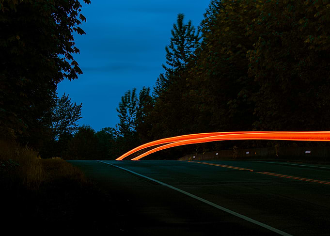 Night Road with Red Taillights