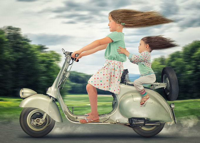 Girls on Vintage Scooter