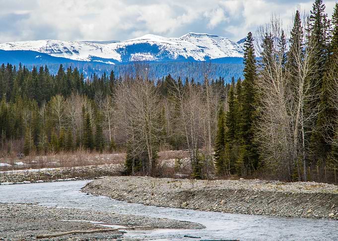 River Winding Through Mountains