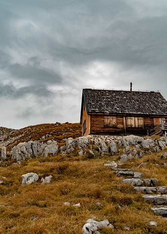 Wooden Cabin on Mountainside