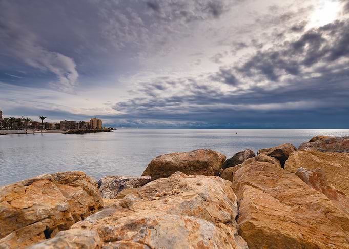 Coastal Rockscape with Cloudy Sky