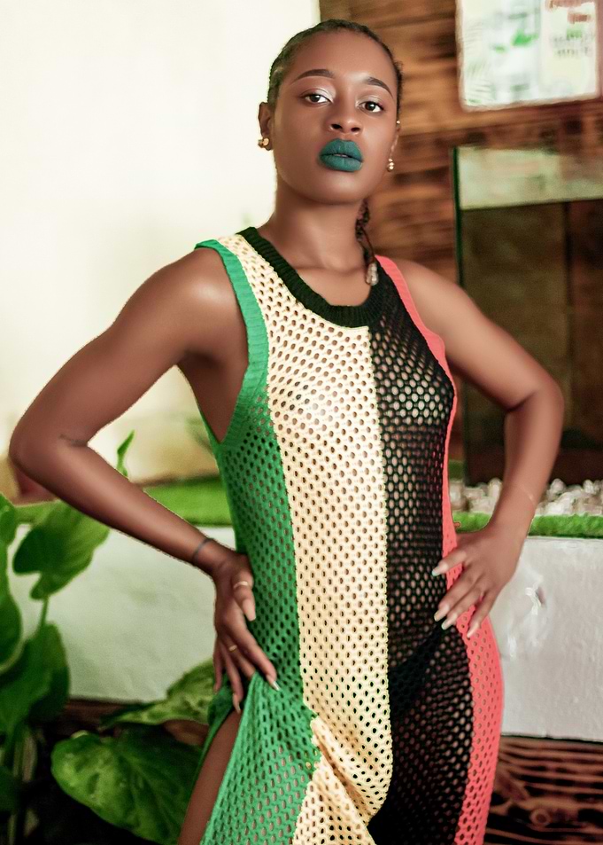 Woman in Green, Yellow, and Black Dress