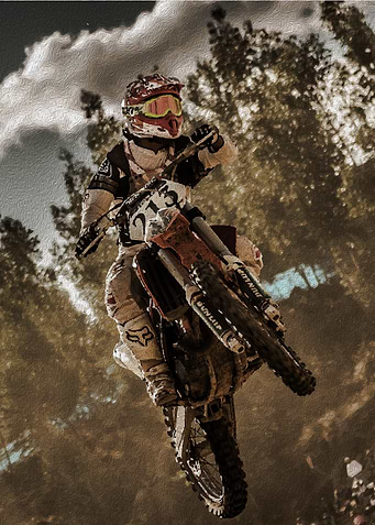 Motocross Rider in Flight