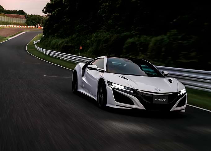 White Honda NSX on Race Track