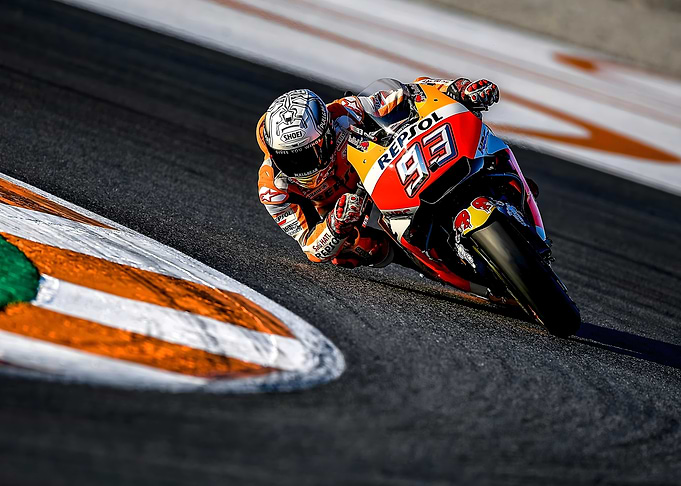 MotoGP Racer Leaning into Turn