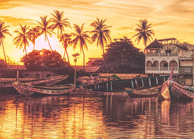 Sunset Boats in Tropical Harbor