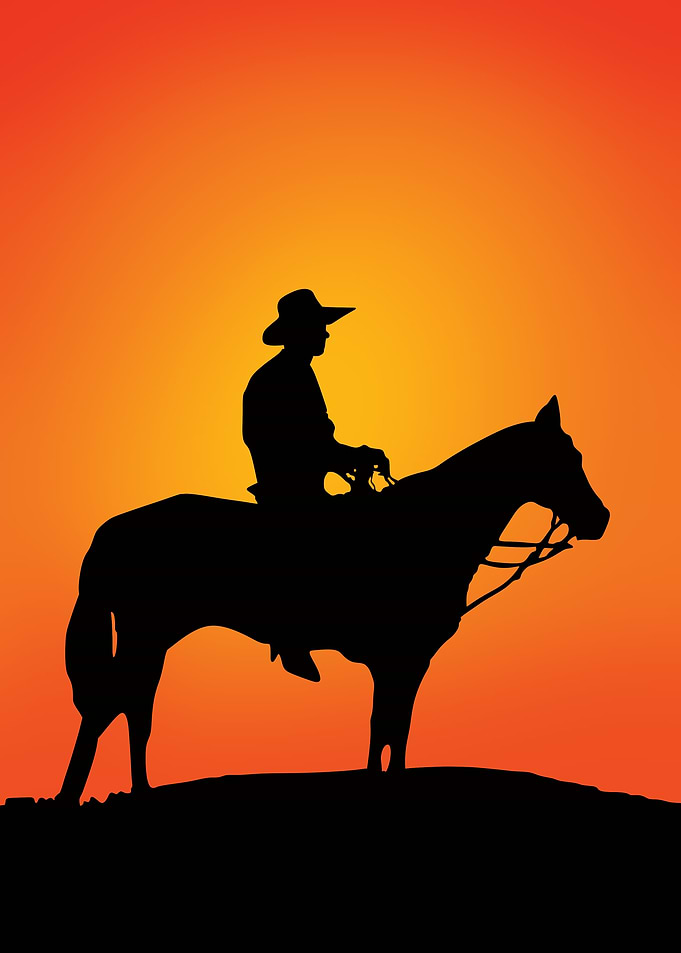 Cowboy Silhouette at Sunset
