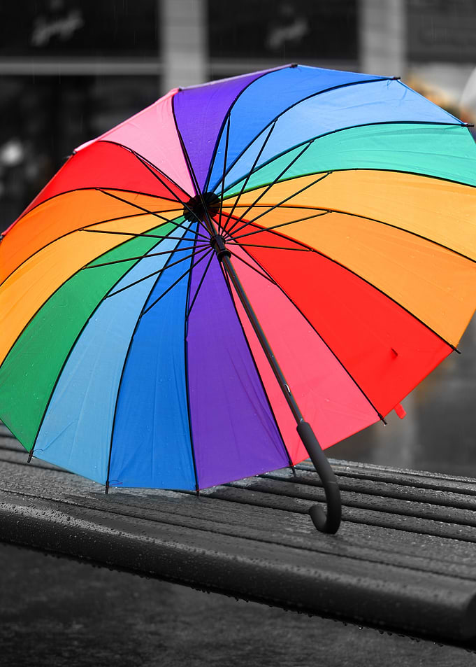 Rainbow Umbrella on Bench