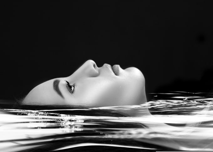 Woman Floating in Water