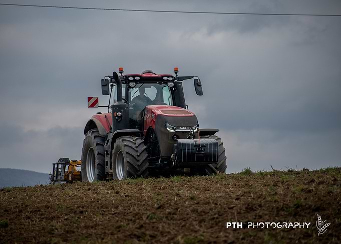 Red Tractor in Field