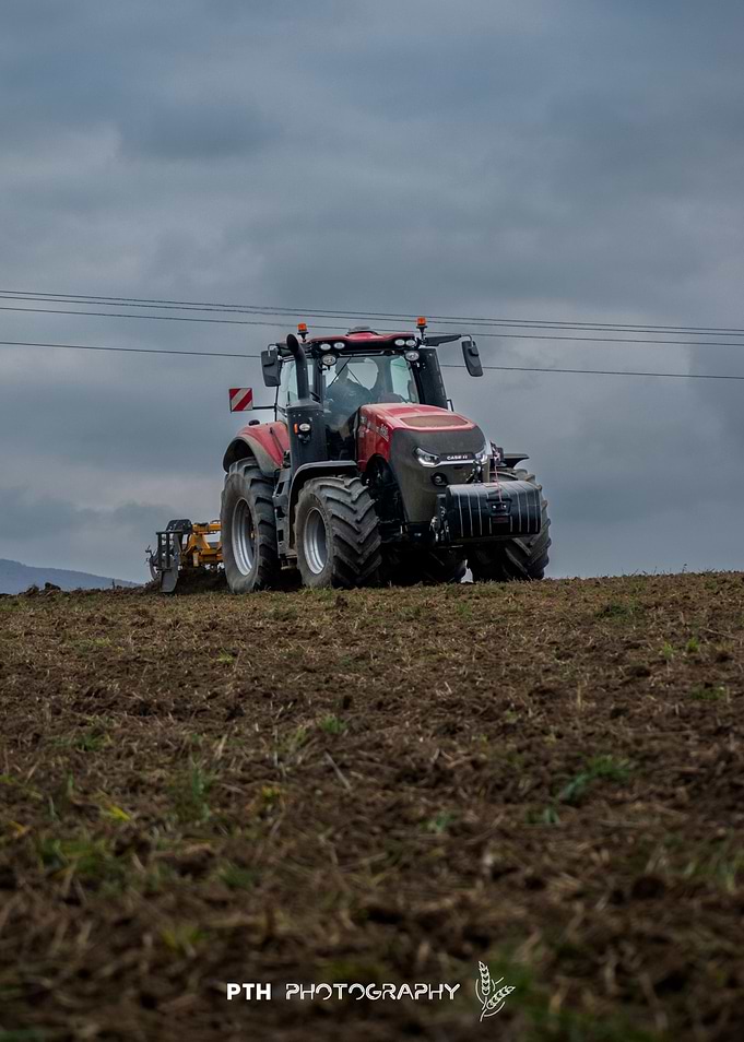 Red Tractor in Field