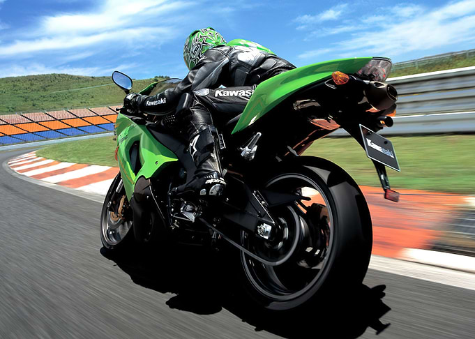 Green Kawasaki Motorcycle on Track
