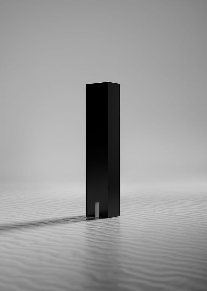 Black Monolith on Rippled Surface