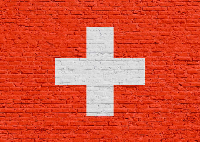 Switzerland - Swiss Flag on Brick Wall