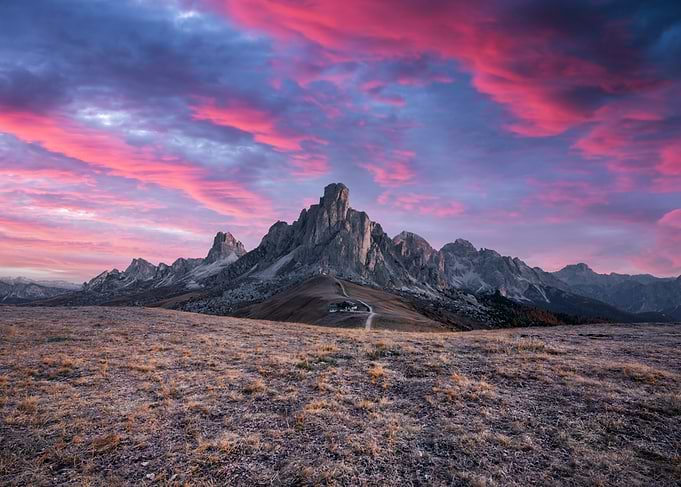 Picturesque landscape during incredible pink sunset in Italian Dolomites