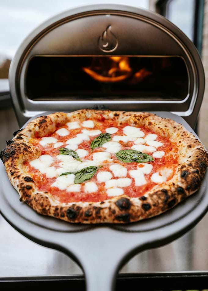 pizza in wood fired oven