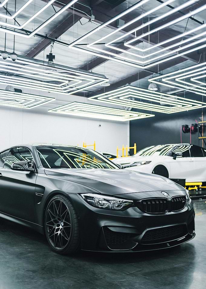 Black BMW M4 in Garage