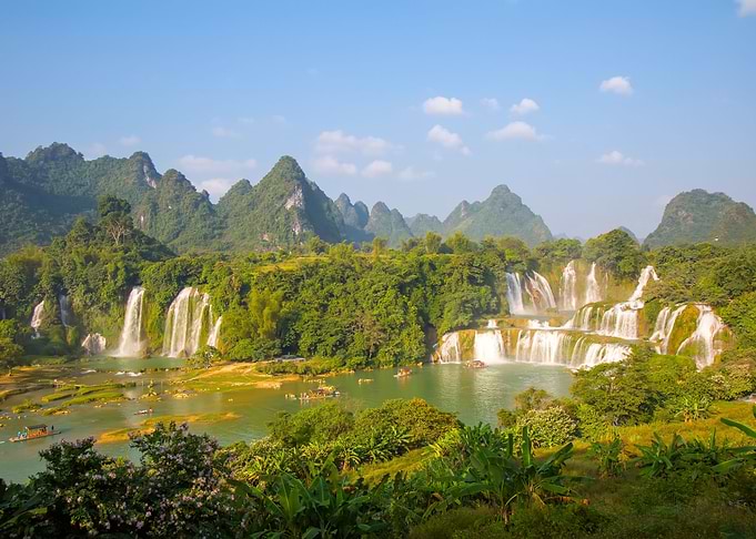 Waterfall in Lush Landscape