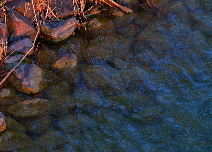 Stream Flowing Over Rocks