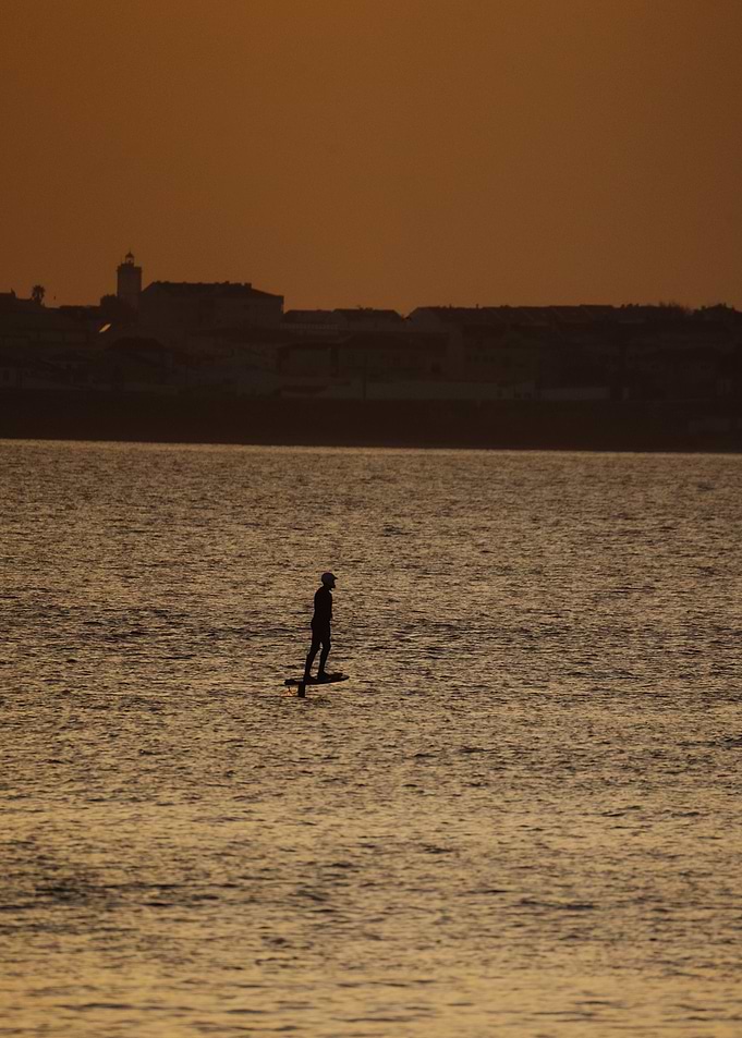 Silhouetted E-Foiler at Sunset Baleal Portugal