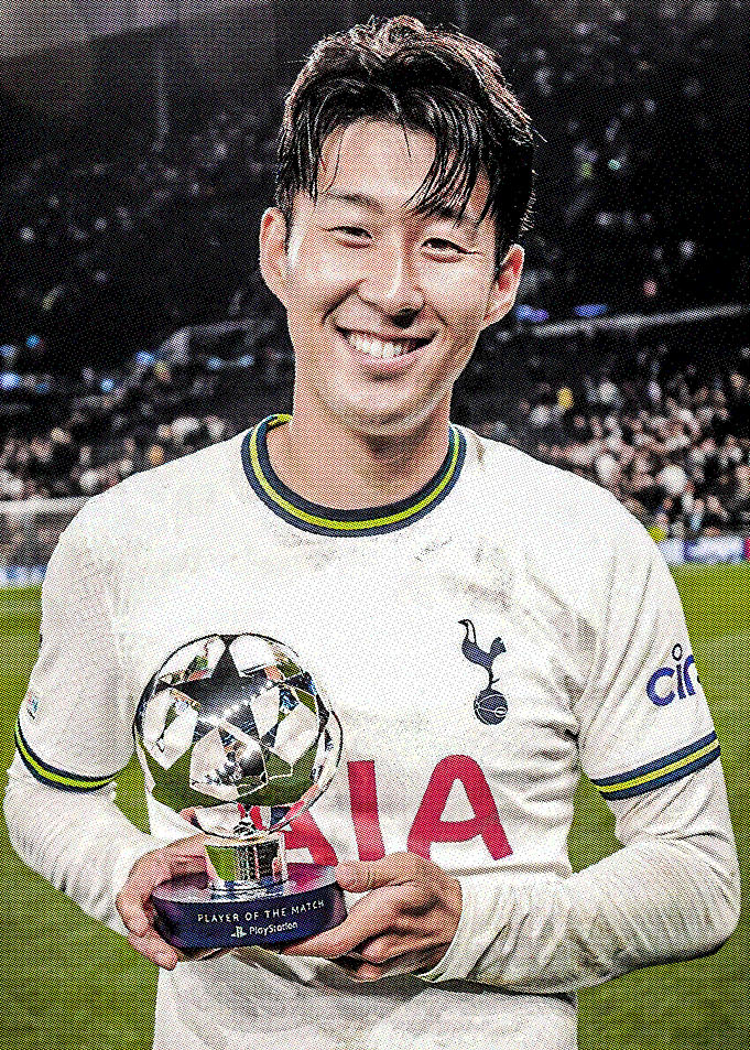 Soccer Player Holding Trophy
