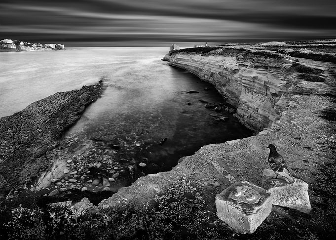 Cliffs in Malta at sunset in long exposure - Black and white landscape