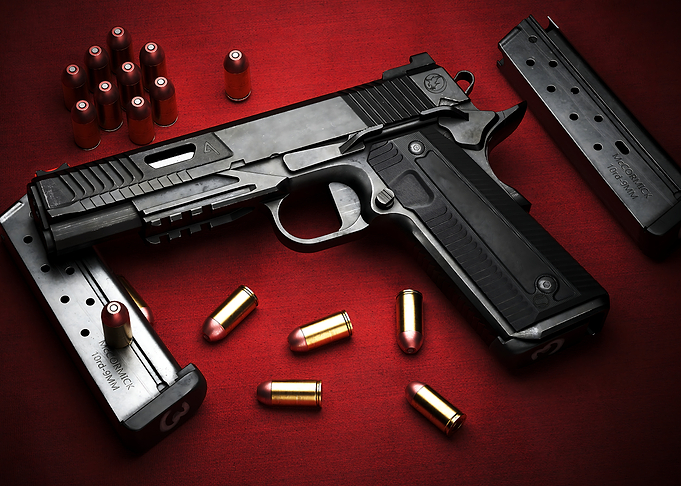Black Handgun with Bullets