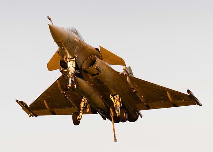 Rafale M landing at sunset