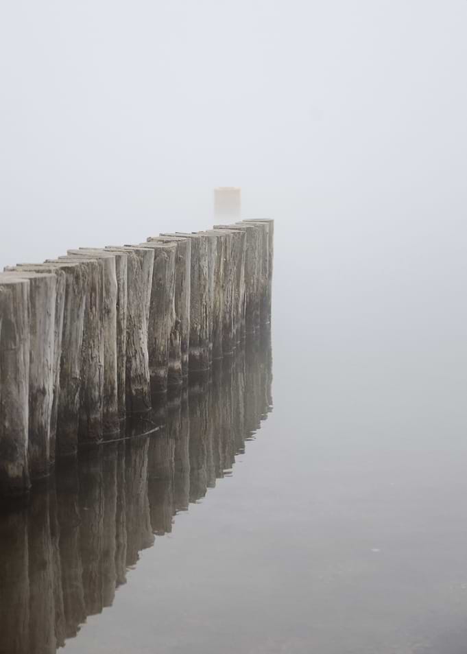 Foggy Pier Reflections
