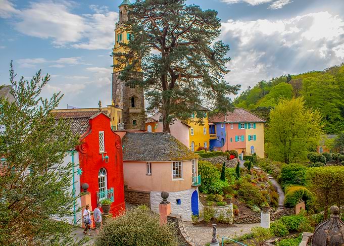 Portmeirion is a folly tourist village in Gwynedd, North Wales Village with Tower