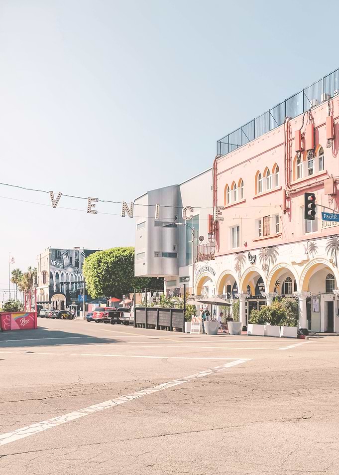 Los Angeles, USA I Venice sign at sunrise at Venice beach in pastel pink summer colors aesthetic with West coast Pacific coastal seaside architecture and a boho vibes retro vintage ambience