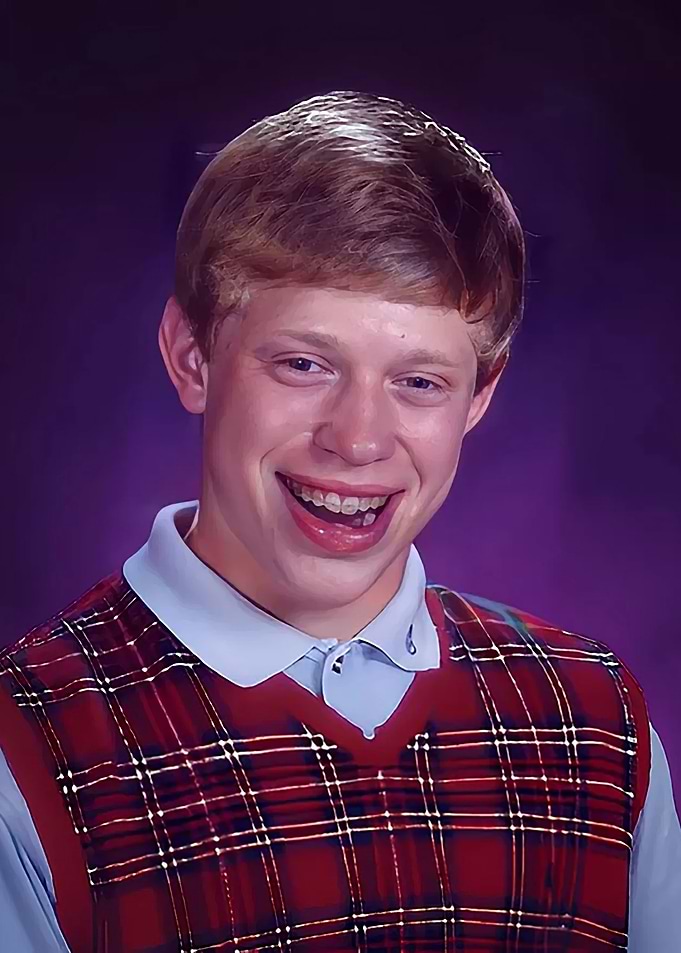 Smiling Boy in Plaid Vest