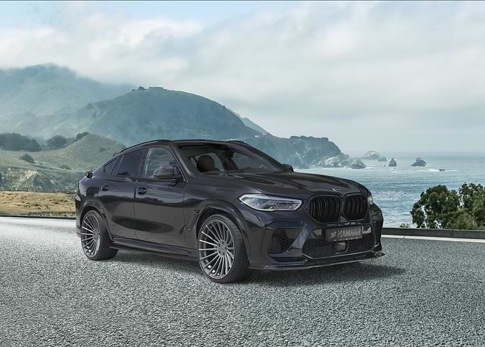 Black BMW X6 on Coastal Road
