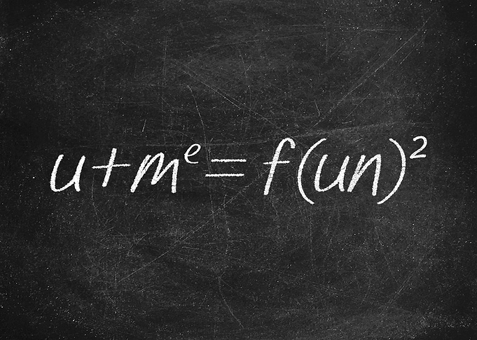 You Plus Me Equals Fun Squared Mathematical Equation on Blackboard