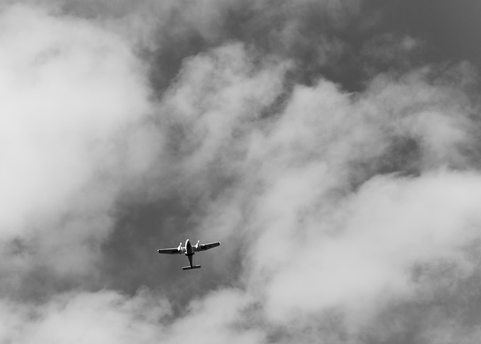 Airplane in Cloudy Sky