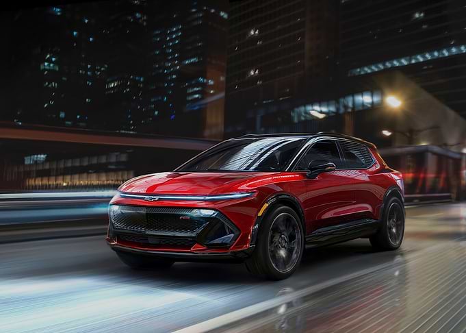 Red Chevrolet SUV Night Drive