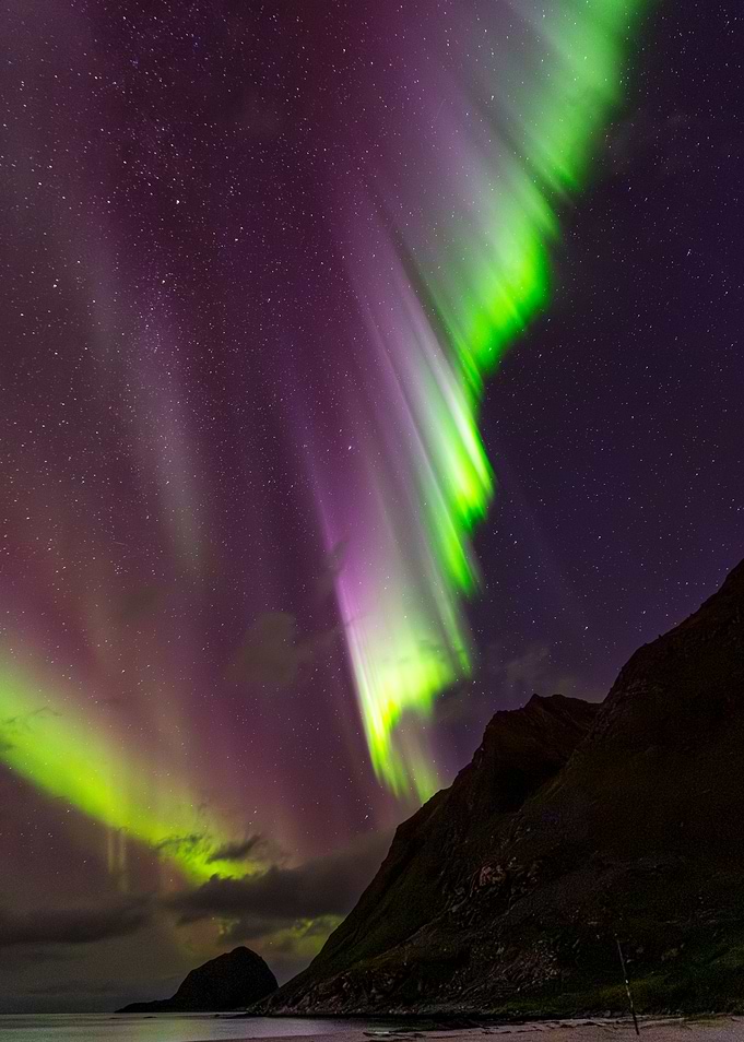 Northern Lights Over Mountains