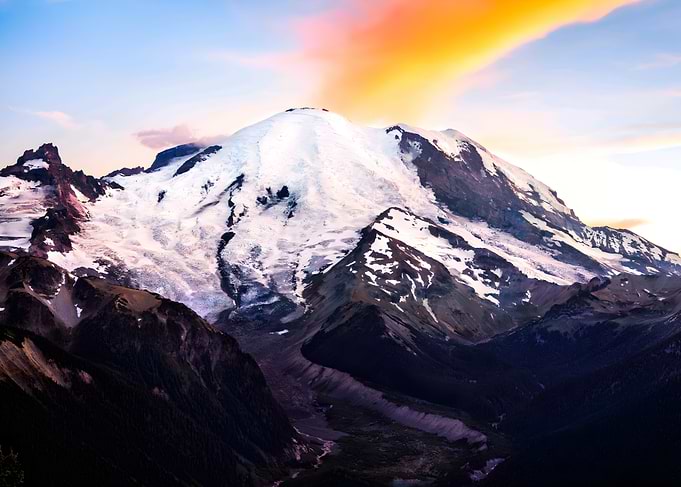 Snowy Mountain Peak at Sunset