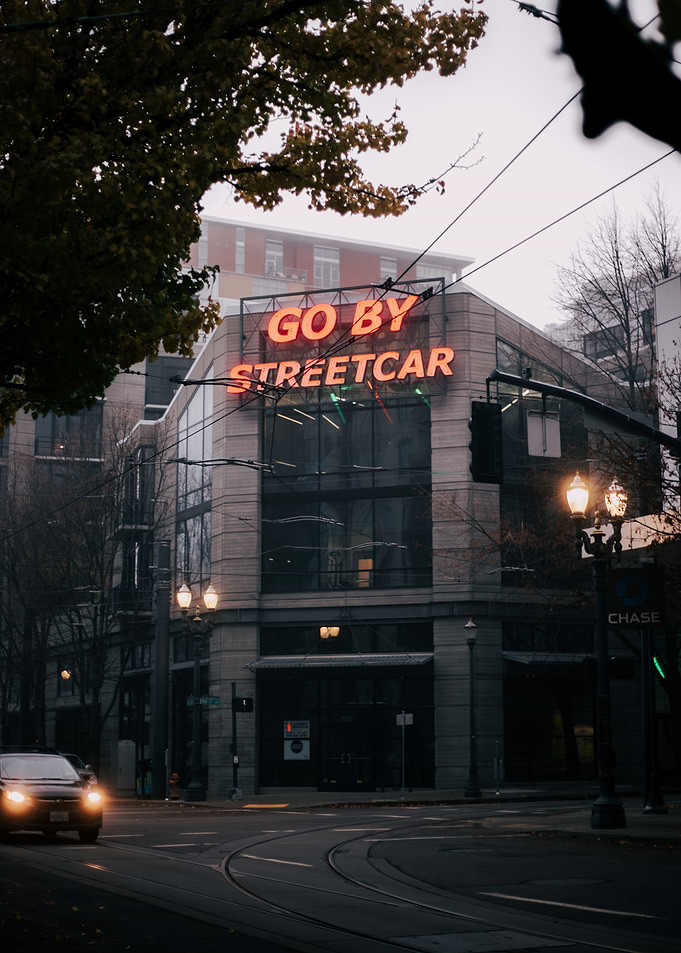 Go By Streetcar Sign