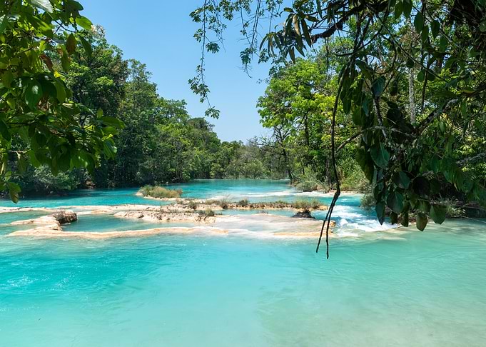 Turquoise Waterfalls in Lush Jungle