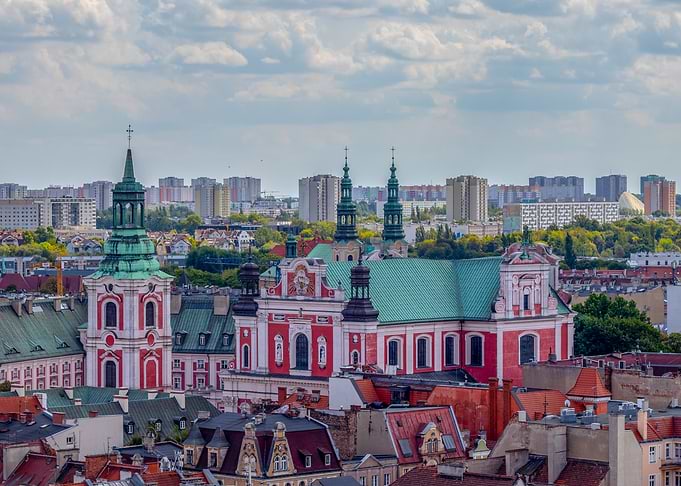 Church in Cityscape,Poznań is a centre of trade, sport, education, technology and tourism
