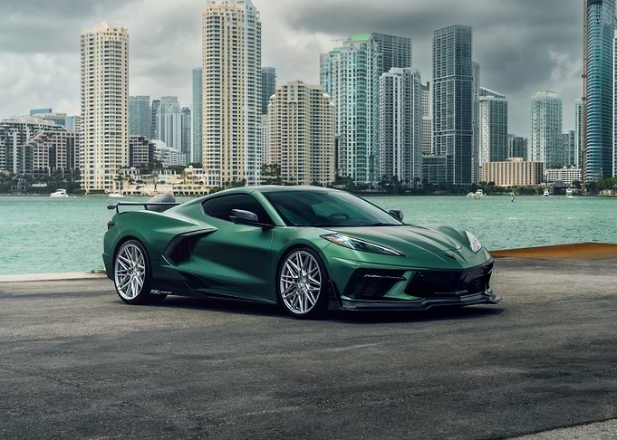 Green Corvette in Cityscape