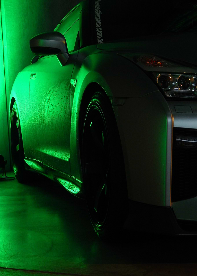 Silver Sports Car in Green Light