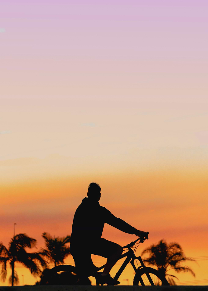 Biking Through a Sunset Paradise