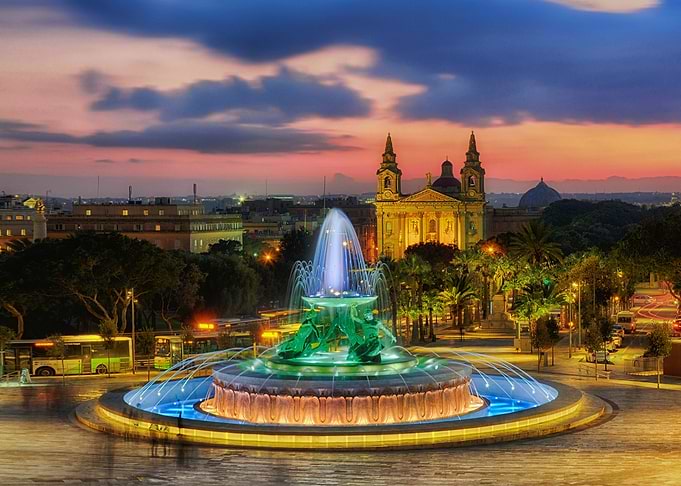 Triton fountain at sunset in Valletta - Cityscape photo