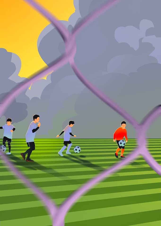 Soccer Players Through Net
