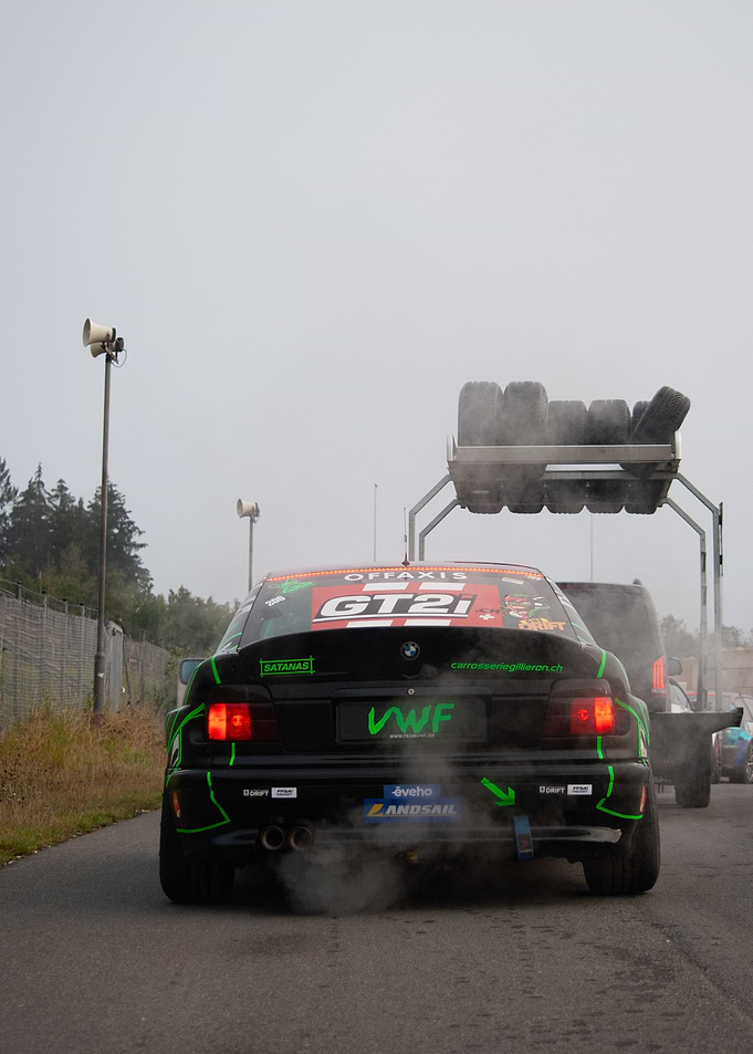 Black BMW E36 with Green Stripes